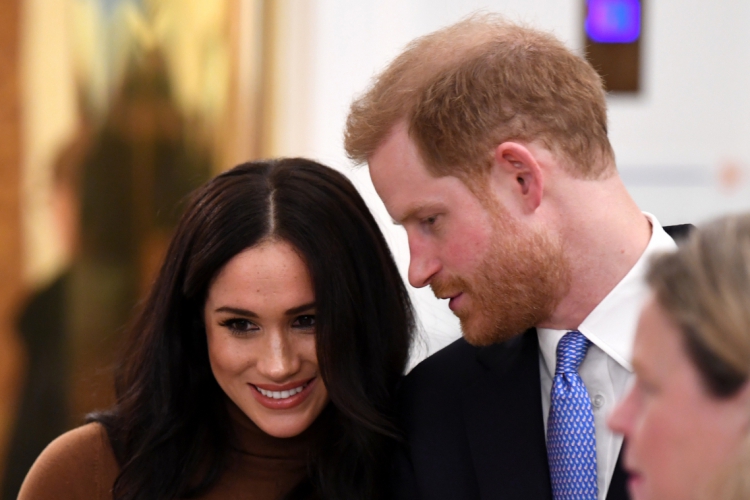 Principe Harry e a duquesa Sussex (Photo by DANIEL LEAL-OLIVAS / POOL / AFP)