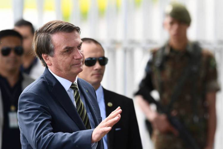 Bolsonaro, ao deixar o Alvorada (Foto de EVARISTO SA / AFP)