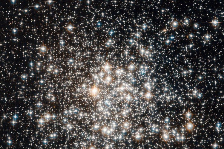 The NASA/ESA Hubble Space Telescope has captured a crowd of stars that looks rather like a stadium darkened before a show, lit only by the flashbulbs of the audience