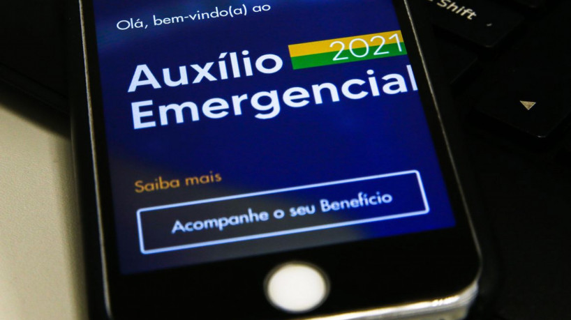 Beneficiários do Bolsa Família com NIS 9 recebem pagamento da 5ª parcela do Auxílio Emergencial 2021, mas público geral não será pago hoje, 30; veja tabela calendário(foto: Marcello Casal Jr/Agência Brasil; /Agência Brasil)