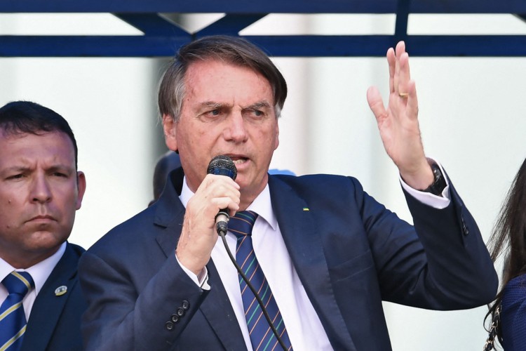 Jair Bolsonaro em cerimônia da filiação ao PL, nesta terça-feira, 30, em Brasília. (Photo by EVARISTO SA / AFP).