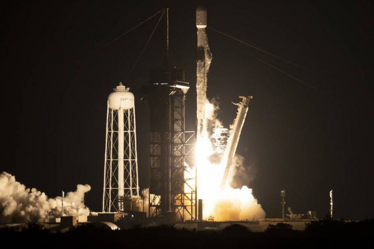 A SpaceX Falcon 9 rocket launches with NASA’s Imaging X-ray Polarimetry Explorer (IXPE) spacecraft onboard from Launch Complex 39A, Thursday, Dec. 9, 2021, at NASA’s Kennedy Space Center in Florida. The IXPE spacecraft is the first satellite dedicated to measuring the polarization of X-rays from a variety of cosmic sources, such as black holes and neutron stars. Launch occurred at 1:00 a.m. EST.  Photo Credit: (NASA/Joel Kowsky)