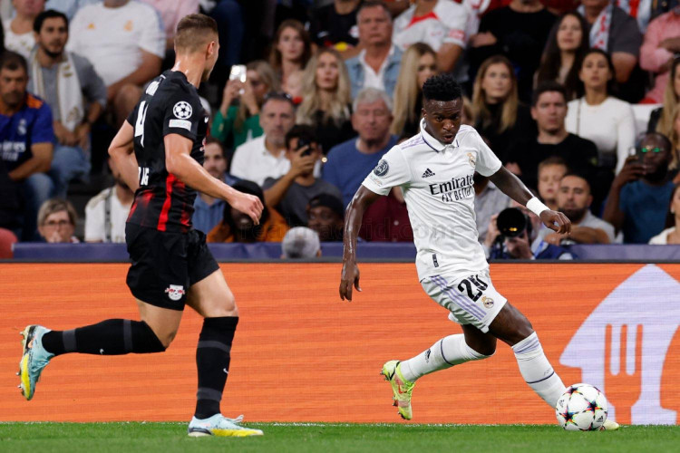 Atacante Vinícius Júnior durante partida da Champions League entre Real Madrid e RB Leipzig