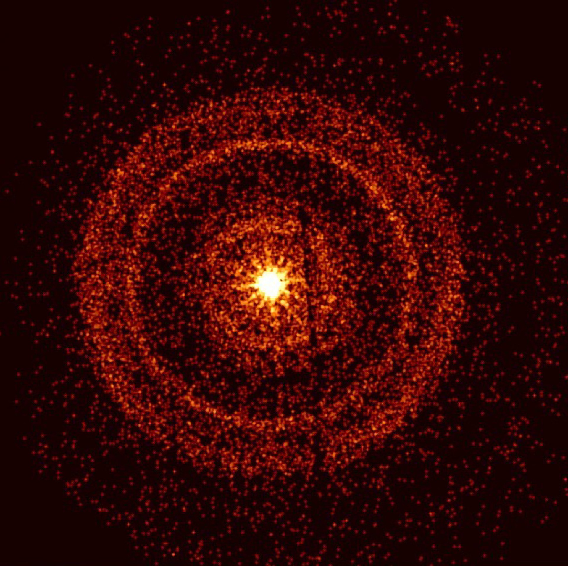 O Telescópio de Raios-X Swift capturou o brilho de GRB 221009A cerca de uma hora depois de ter sido detectado pela primeira vez. Os anéis brilhantes se formam como resultado de raios-X espalhados por camadas de poeira não observáveis ​​dentro de nossa galáxia que se encontram na direção da explosão. A linha vertical escura é um artefato do sistema de imagem  (Foto: NASA/Swift/A. Beardmore (Universidade de Leicester))