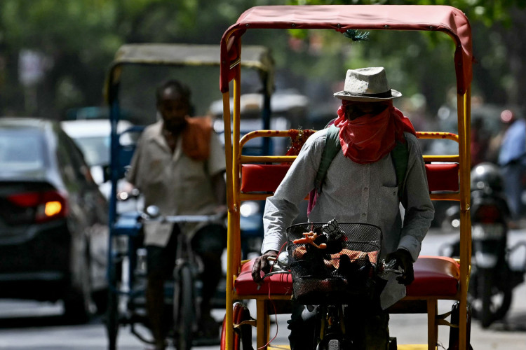 As temperaturas em Nova Delhi, capital da Índia, atingiram um recorde de 49,9 graus Celsius.