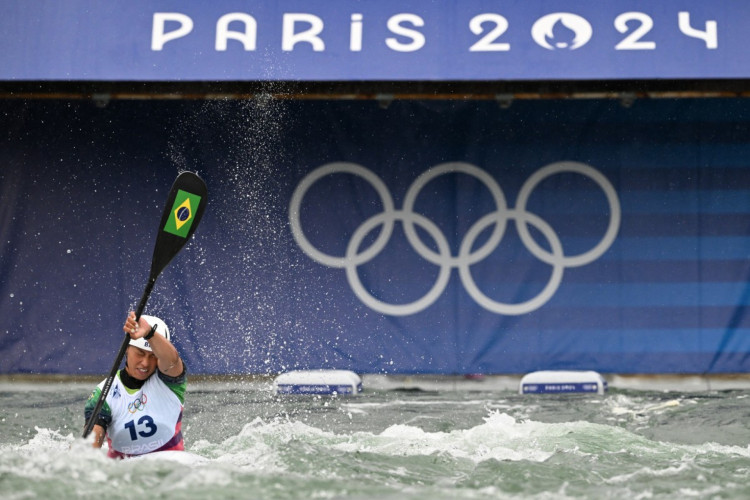 Brazil's Ana Satila competes in the women's kayak single heats canoe slalom competition at Vaires-sur-Marne Nautical Stadium in Vaires-sur-Marne during the Paris 2024 Olympic Games on July 27, 2024.