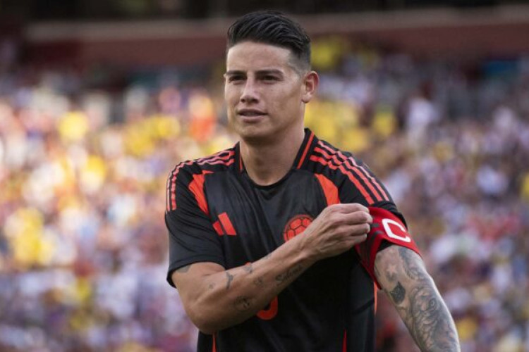 Colombia's forward #10 James Rodriguez adjusts his captain arm band during the international friendly football match between the USA and Colombia at Commanders Field in Greater Landover, Maryland, on June 8, 2024. (Photo by ROBERTO SCHMIDT / AFP) (Photo by ROBERTO SCHMIDT/AFP via Getty Images)