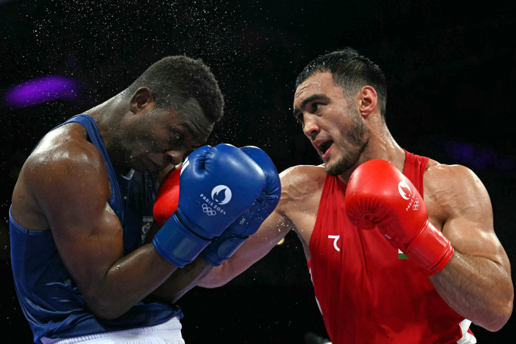 Brasileiro Keno Machado foi amassado pelo atleta uzbeque no boxe. 