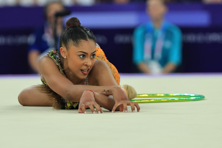 Barbara Domingos foi a primeira brasileira a se classificar para a final individual da ginástica rítmica em Olimpíadas. Babi terminou a competição entre as 10 melhores do mundo 