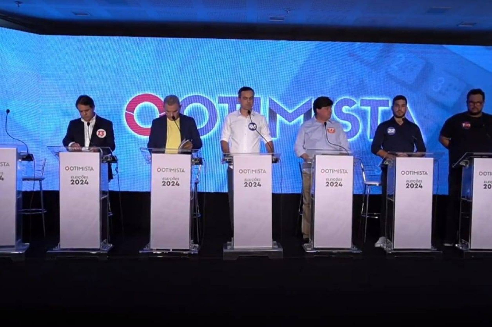 Debate contou com a presença dos candidatos André Fernandes, Capitão Wagner, Evandro Leitão, George Lima, José Sarto e Técio Nunes. Eduardo Girão chegou a participar, mas foi retirado (Foto: Reprodução/Youtube TV Otimista)