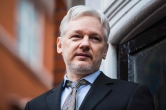 (FILES) This file photo taken on February 5, 2016 shows WikiLeaks founder Julian Assange addressing the media from the balcony of the Ecuadorian embassy in central London.
Hillary Clinton has a personal grudge against WikiLeaks founder Julian Assange and will make his life even more difficult if she is elected US president, one of his closest collaborators said Thursday. / AFP PHOTO / Jack Taylor